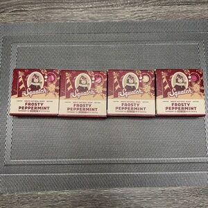 4 bars of 5 oz Dr. Squatch frosty peppermint bar soap. Handmade w/ Shea butter.